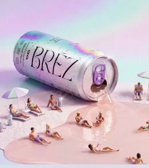 BRĒZ reklamı: dev kutu yan yatmış, içinden akan sıvı plaja dönüşüyor, kumsalda minik insanlar